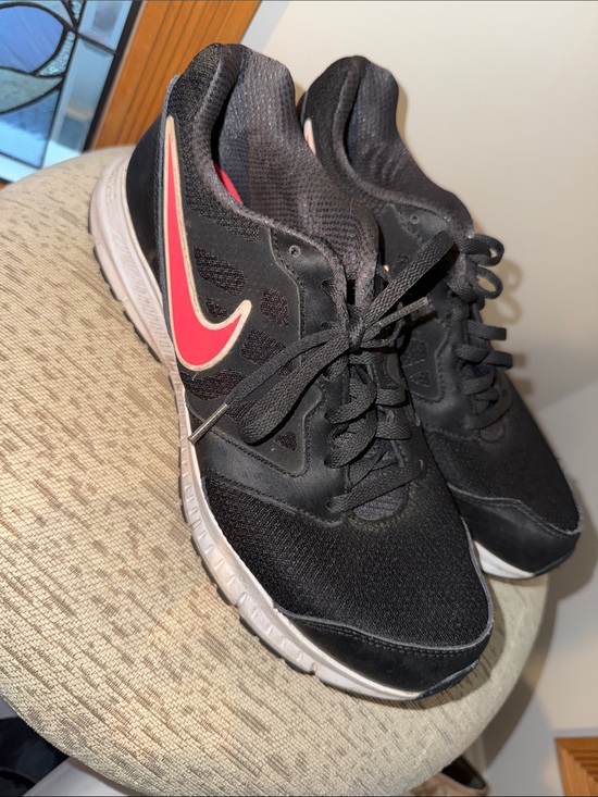 Nike Shoes - Nike Black Sneakers with Pink Swoosh Accent